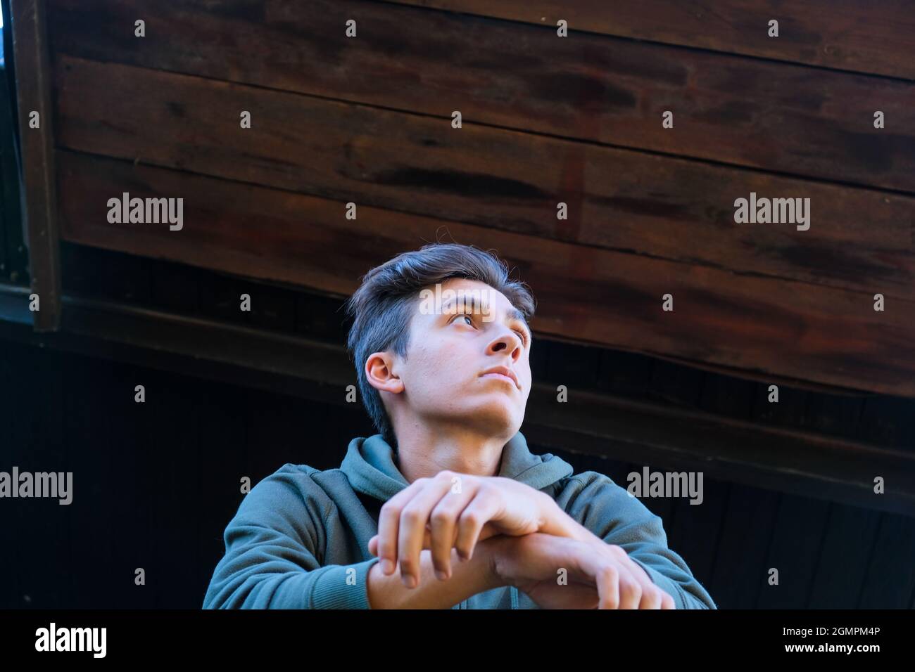 Handsome young man portrait in outdoor. Alternative lifestyle. Stock Photo