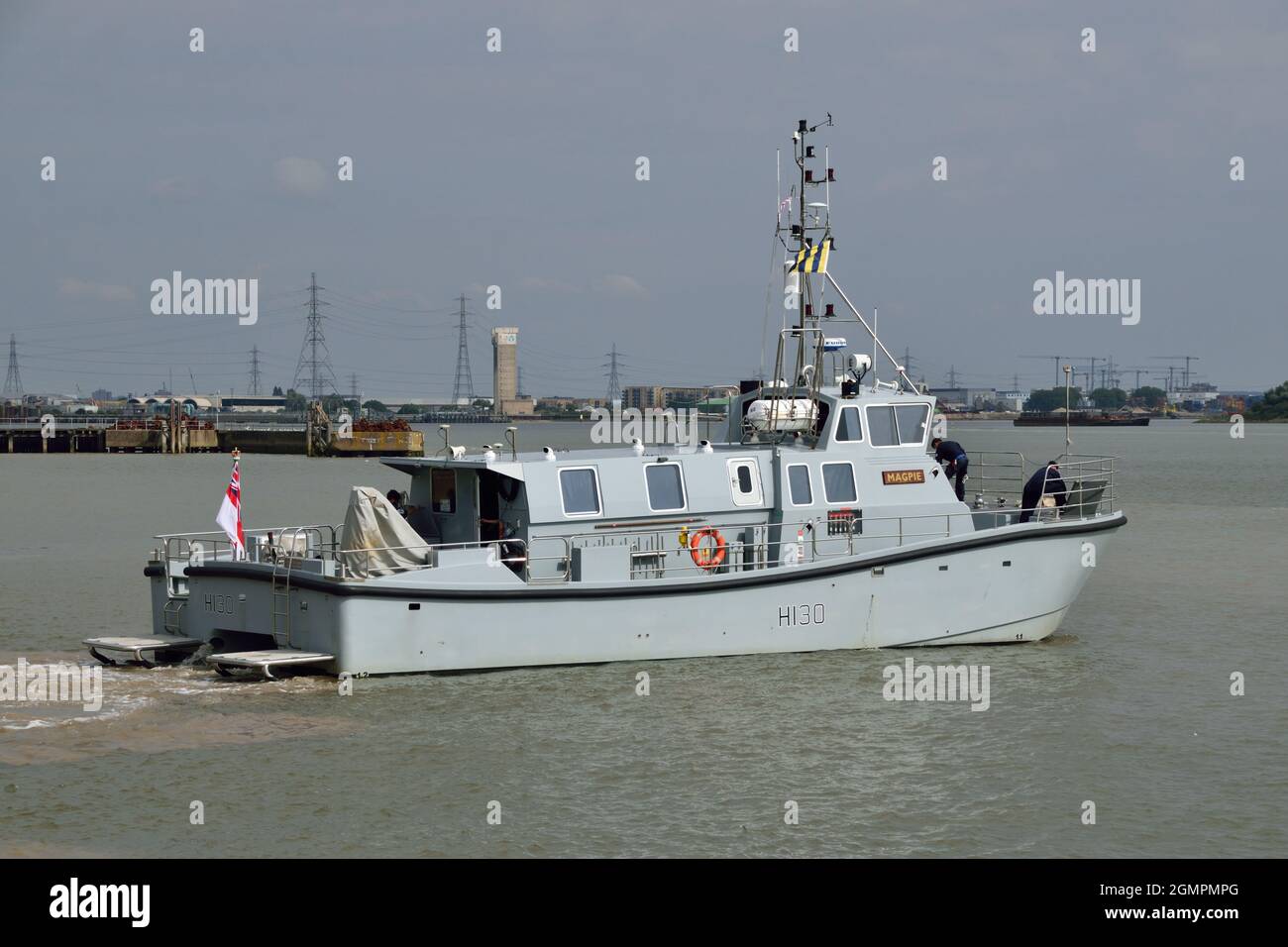 Royal Navy survey vessel HMS MAGPIE leaving London's Royal Docks after taking part in DSEI 2021 event Stock Photo