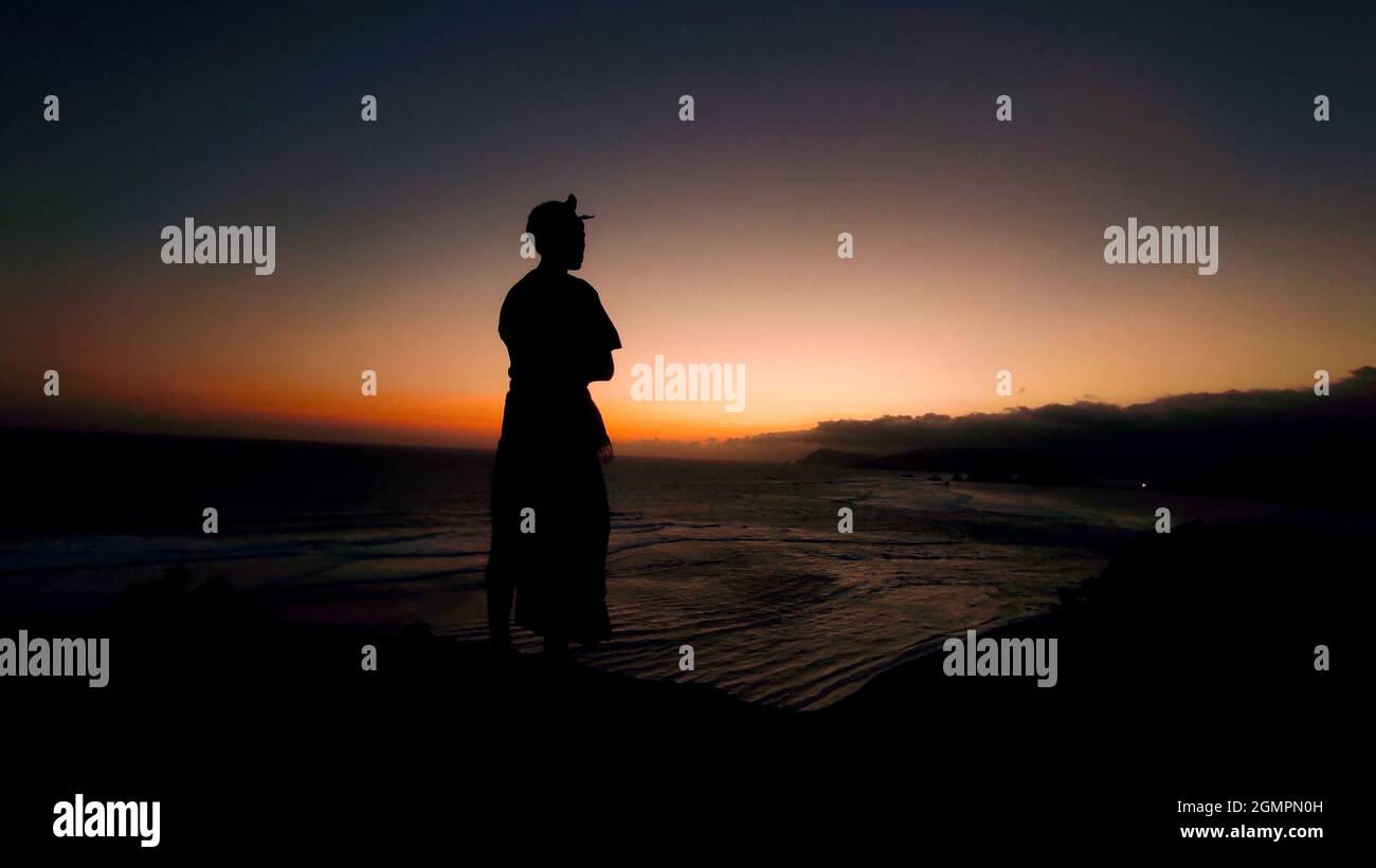 A silhouette man with a beautiful background view after sunset Stock ...