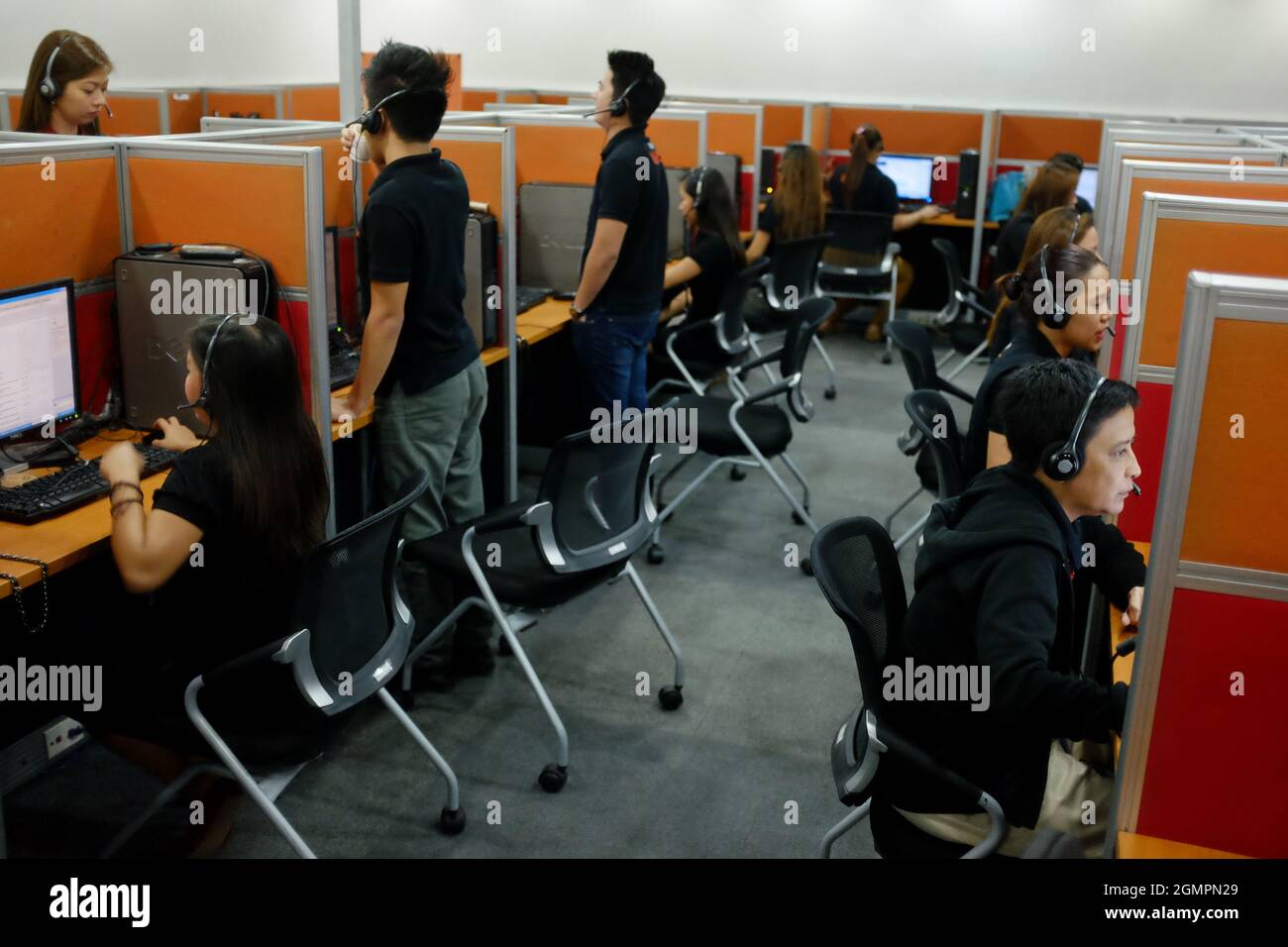 The night shift at the Visaya Knowledge Process Outsourcing (VKPO) call center, in Makati. Stock Photo