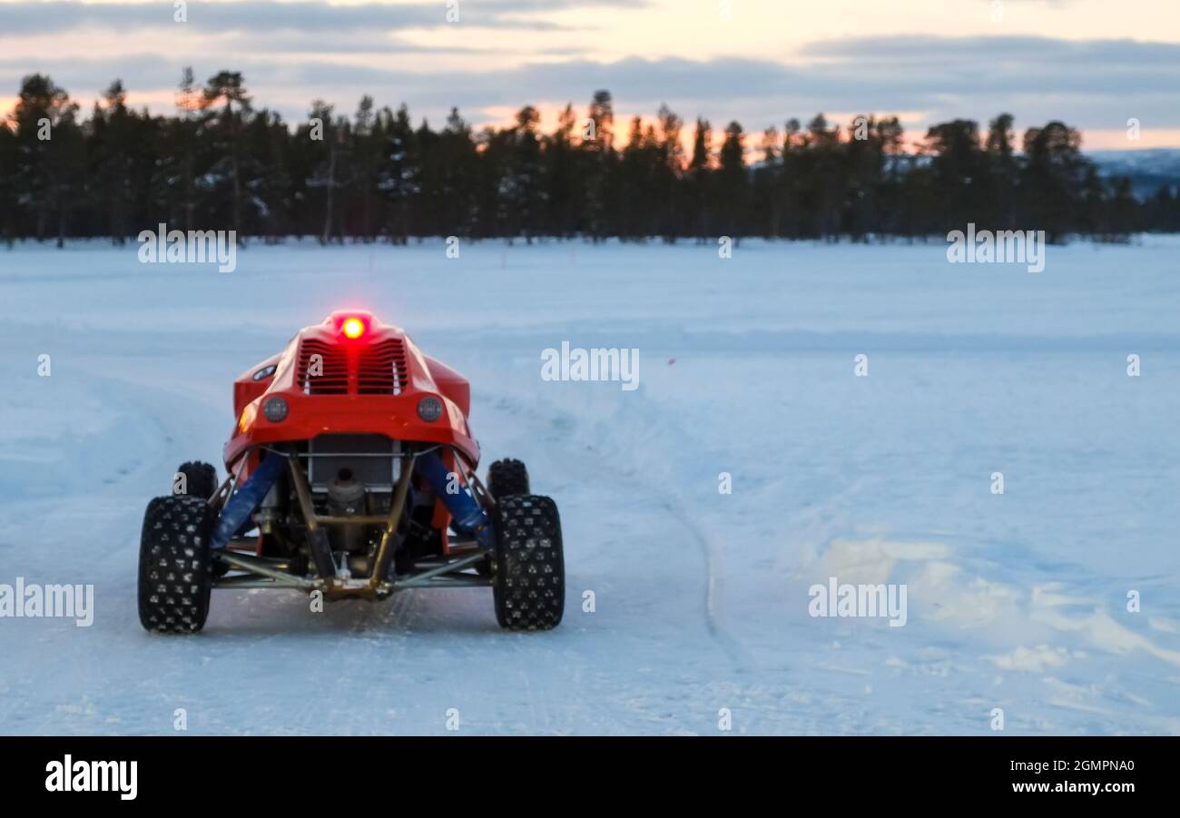Buggy on the snow. Offroad adrenaline actrivities in beautiful landscape Stock Photo