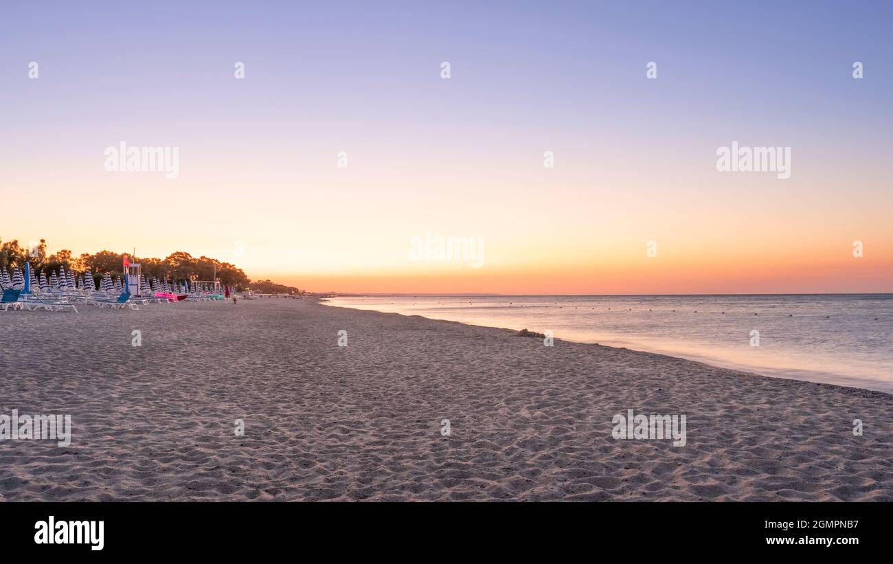 Landscape of beautiful sea and beach with parasol at sunny day, Simeri  Mare, Calabria, Southern Italy Stock Photo - Alamy
