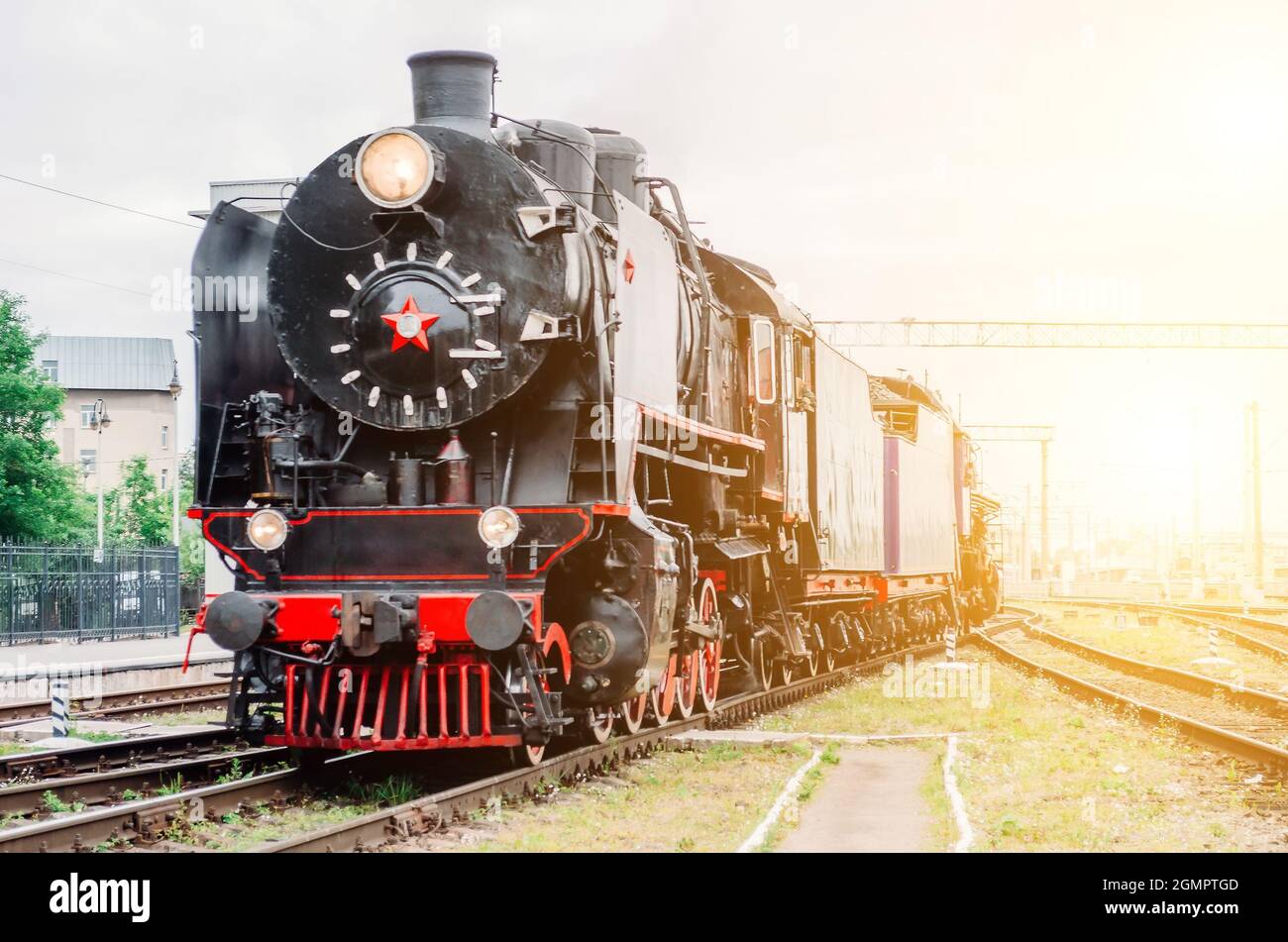 Vintage black steam locomotive train rush railway station Stock Photo ...