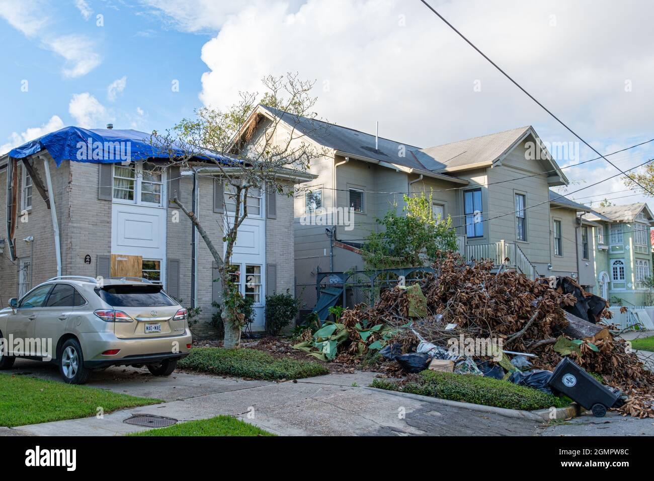NEW ORLEANS, LA, USA SEPTEMBER 16, 2021 Damaged house and pile of