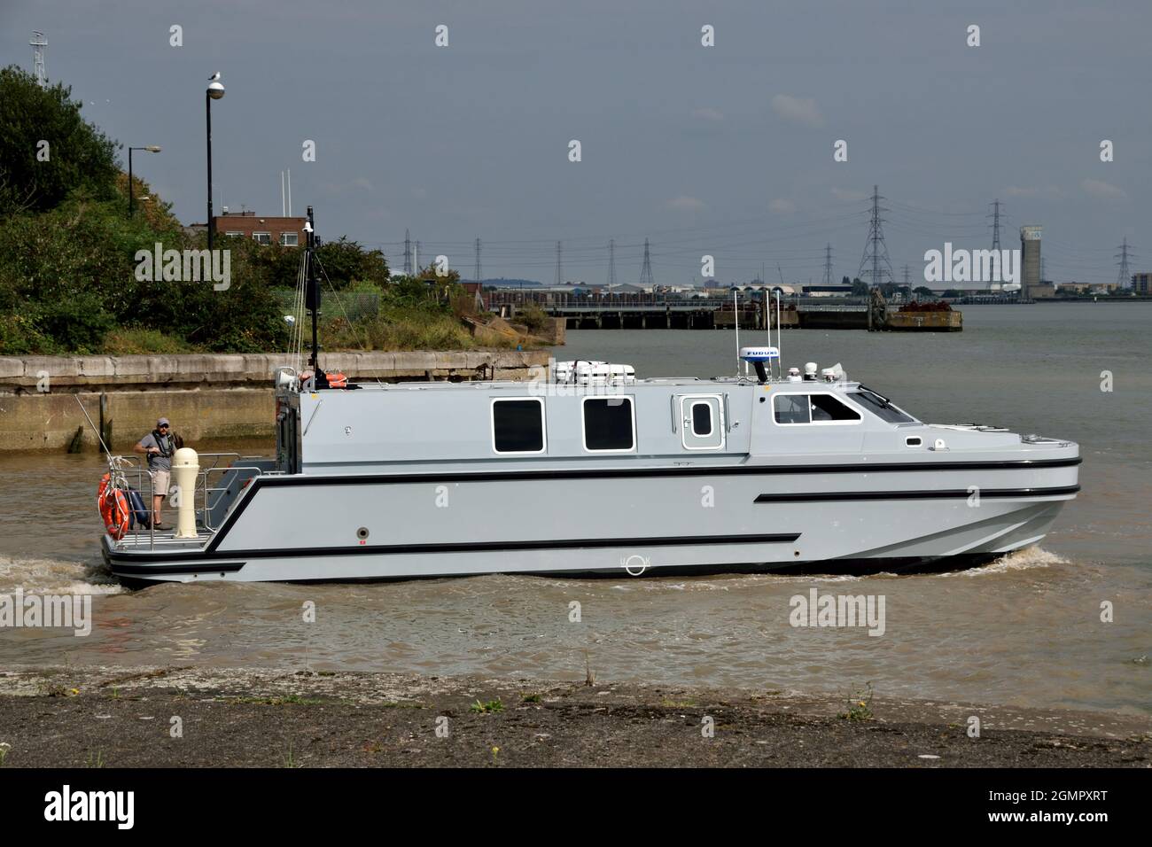 Royal Navy Officer Training Boat OTB-08 leaving London's Royal Docks after taking part in DSEI 2021 event Stock Photo