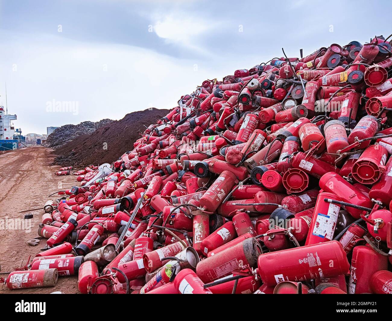 Many used fire extinguishers are prepared for loading and recycling at