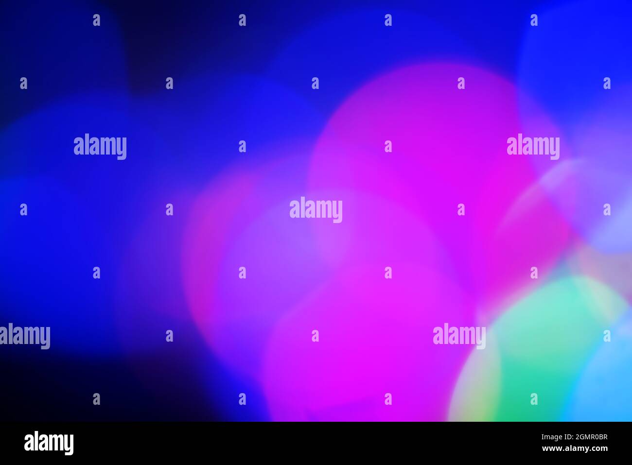 Defocused light dots abstract background. Garland defocus light glare. Stock Photo