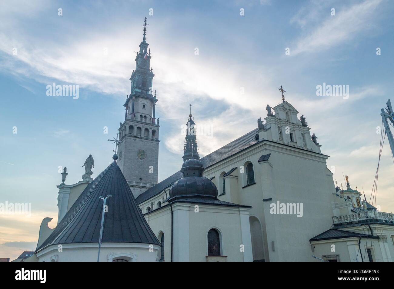 Roofs of Jasna Gora Monastery and belfry and the tower at sunset in Czestochowa, Poland. Stock Photo