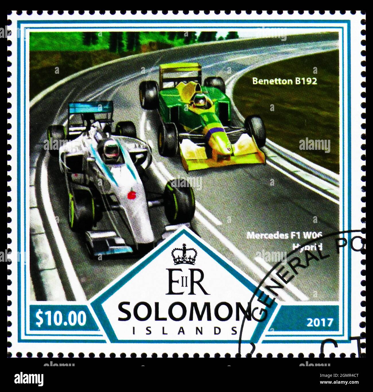 MOSCOW, RUSSIA - JULY 31, 2021: Postage stamp printed on Solomon Islands shows Benetton B192 and Mercedes F1 W06 Hybrid, Formula I serie, circa 2017 Stock Photo