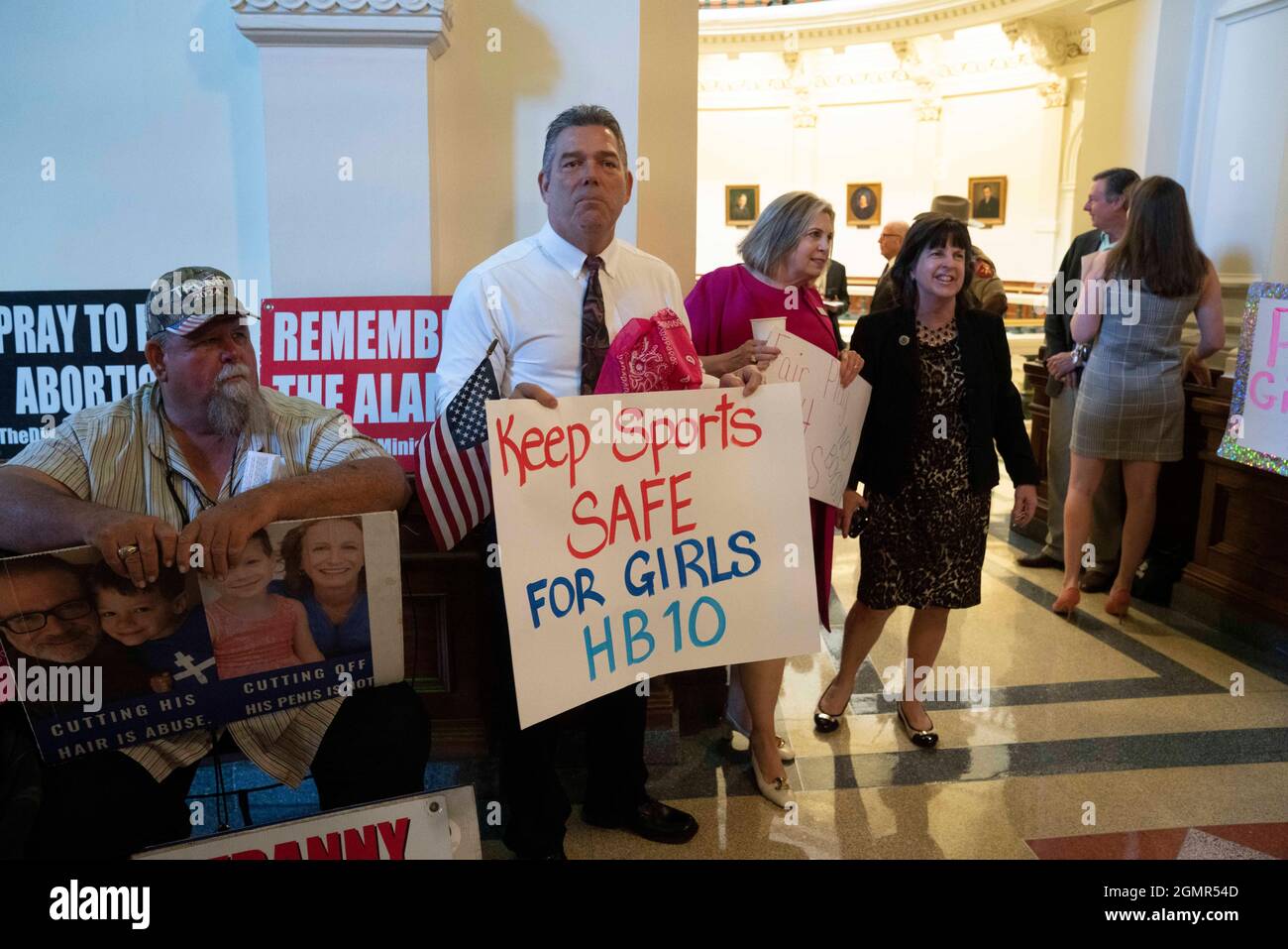 Austin Texas, USA, 20th Sep 2021: A group advocating for a ban on transgender athletes competing in girls sports greets legislators outside the Texas House chamber on the first day of the third called special session. Redistricting will be the main issue facing legislators along with transgender sports and other bills. Credit: Bob Daemmrich/Alamy Live News Stock Photo