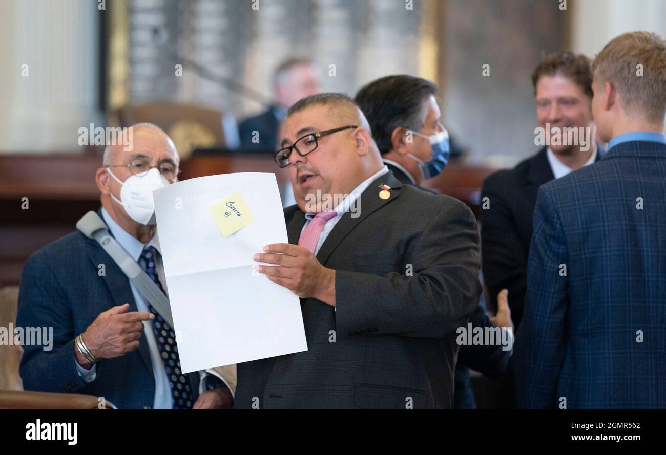 Austin Texas, USA, 20th Sep 2021: State Rep. Bobby Guerra, l, D-McAllen and Rep. Ryan Guillen, D-Rio Grande City, look over a redistricting map on the first day of the third-called special session of the 87th Texas Legislature. Several contentious issues remain after drawn-out regular sessions earlier this year. Credit: Bob Daemmrich/Alamy Live News Stock Photo