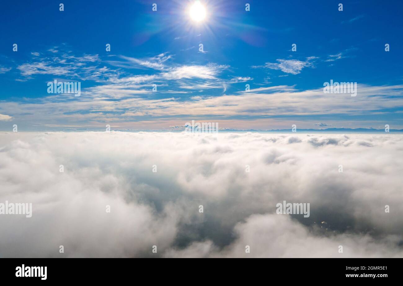 Aerial view from above of white puffy clouds in bright sunny day Stock ...