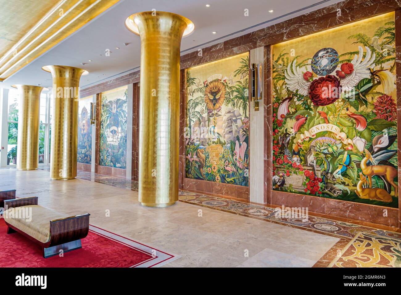 Miami Beach Florida,Faena District,Collins Avenue,Faena Hotel,5-star lobby,wall mural Juan Gatti gold leaf columns décor inside interior Stock Photo