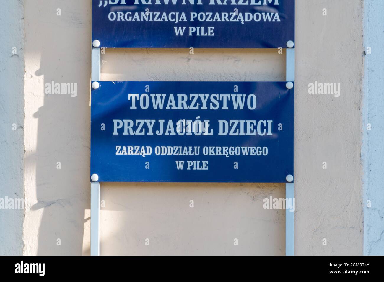 Pila, Poland - May 31, 2021: Sign Society of Friends of Children (Polish: Towarzystwo Przyjaciol Dzieci). Stock Photo