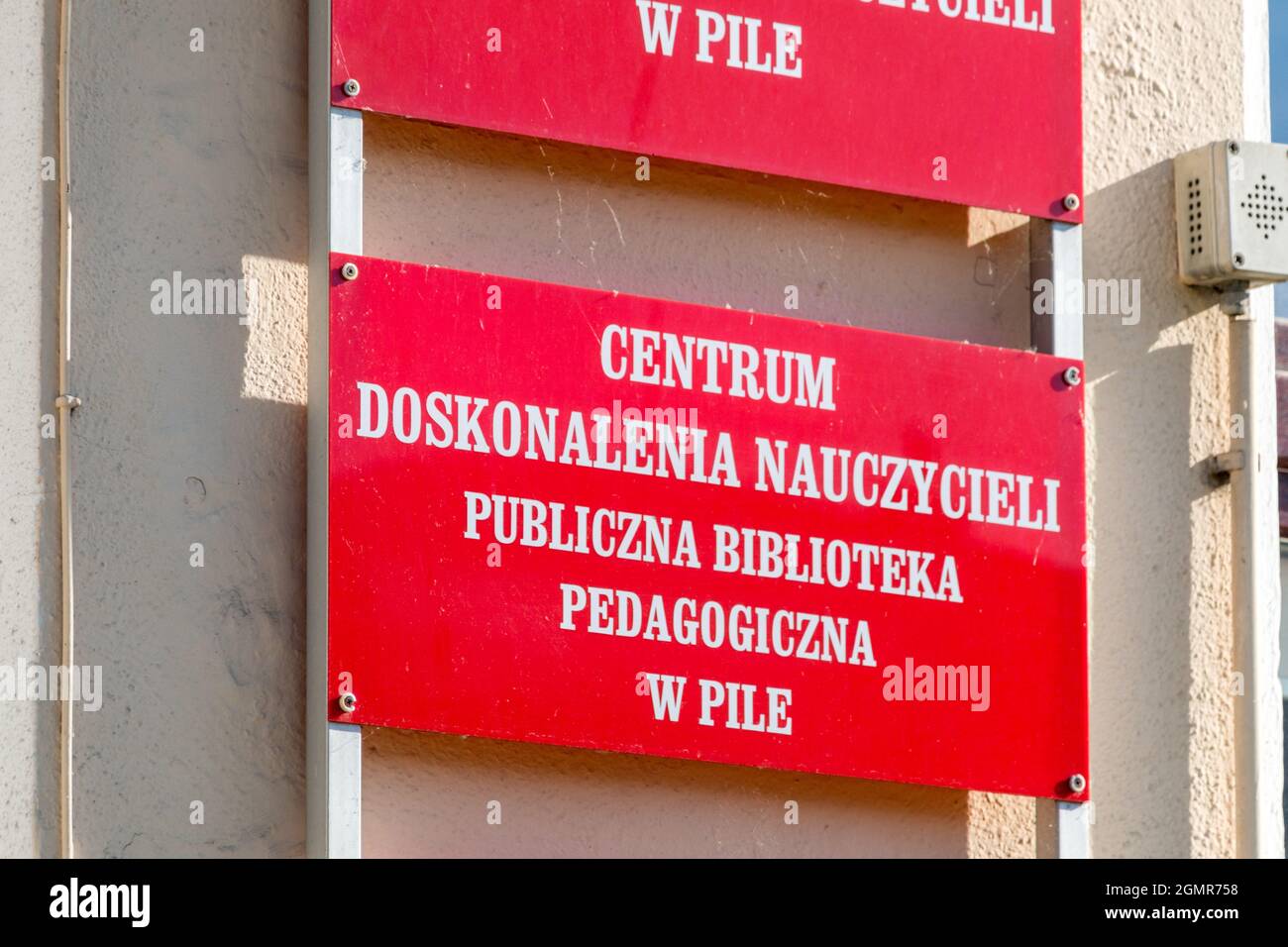 Pila, Poland - May 31, 2021: Sign Teacher Training Center, Public Pedagogical Library in Pila (Polish: Centrum Doskonalenia Nauczycieli, Publiczna bib Stock Photo