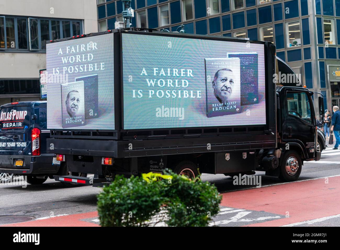 USA. 20th Sep, 2021. Moving vehicle with advertisement of President of Turkey Recep Tayyip Erdoğan book A Fairer World is Possible seen on the 3rd avenue in Manhattan in New York on September 20, 2021. President is about to present his new book to world leaders he is going to meet during High Week of UN General Assembly meetings. (Photo by Lev Radin/Sipa USA) Credit: Sipa USA/Alamy Live News Stock Photo