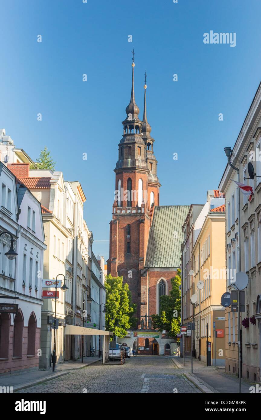 Opole, Poland - June 4, 2021: Bronislawa Koraszewskiego street with Cathedral Basilica of the Exaltation of the Holy Cross (Polish: Bazylika katedraln Stock Photo