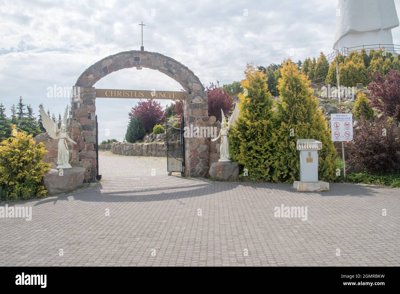 Swiebodzin, Poland - June 1, 2021: Entrance to alley to statue of Christ the King. Stock Photo
