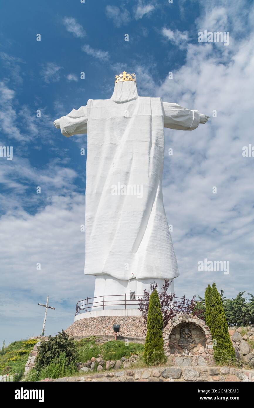Statue of Christ the King from behind in Swiebodzin. Stock Photo