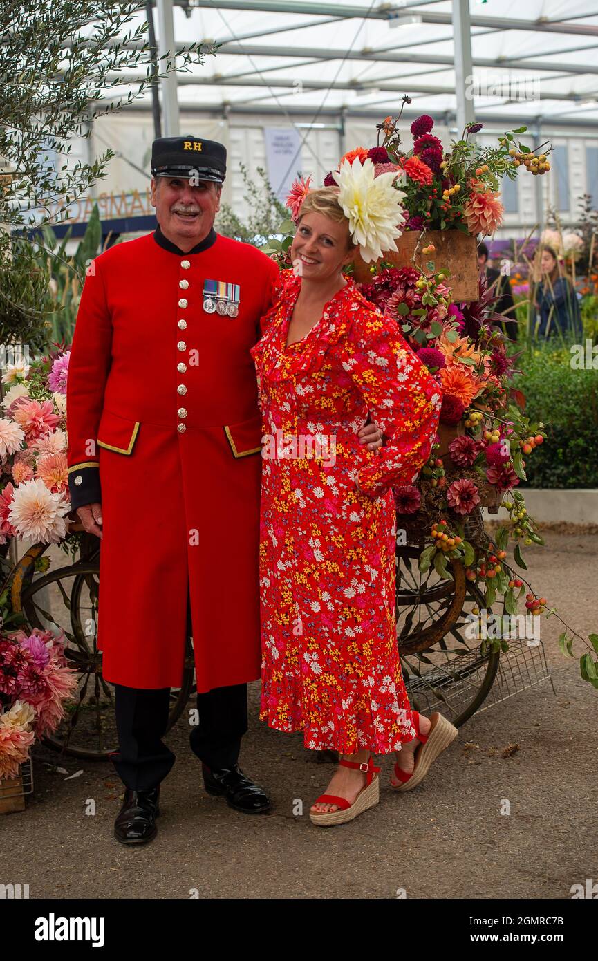 London, UK. 20th September, 2021. Chelsea Pensioner Arthur Currie with Andie McDowell. It was busy day at the Press Day for the first Autumnal RHS Chelsea Flower Show. The show was cancelled last year following the Covid-19 Pandemic. Credit: Maureen McLean/Alamy Live News Stock Photo