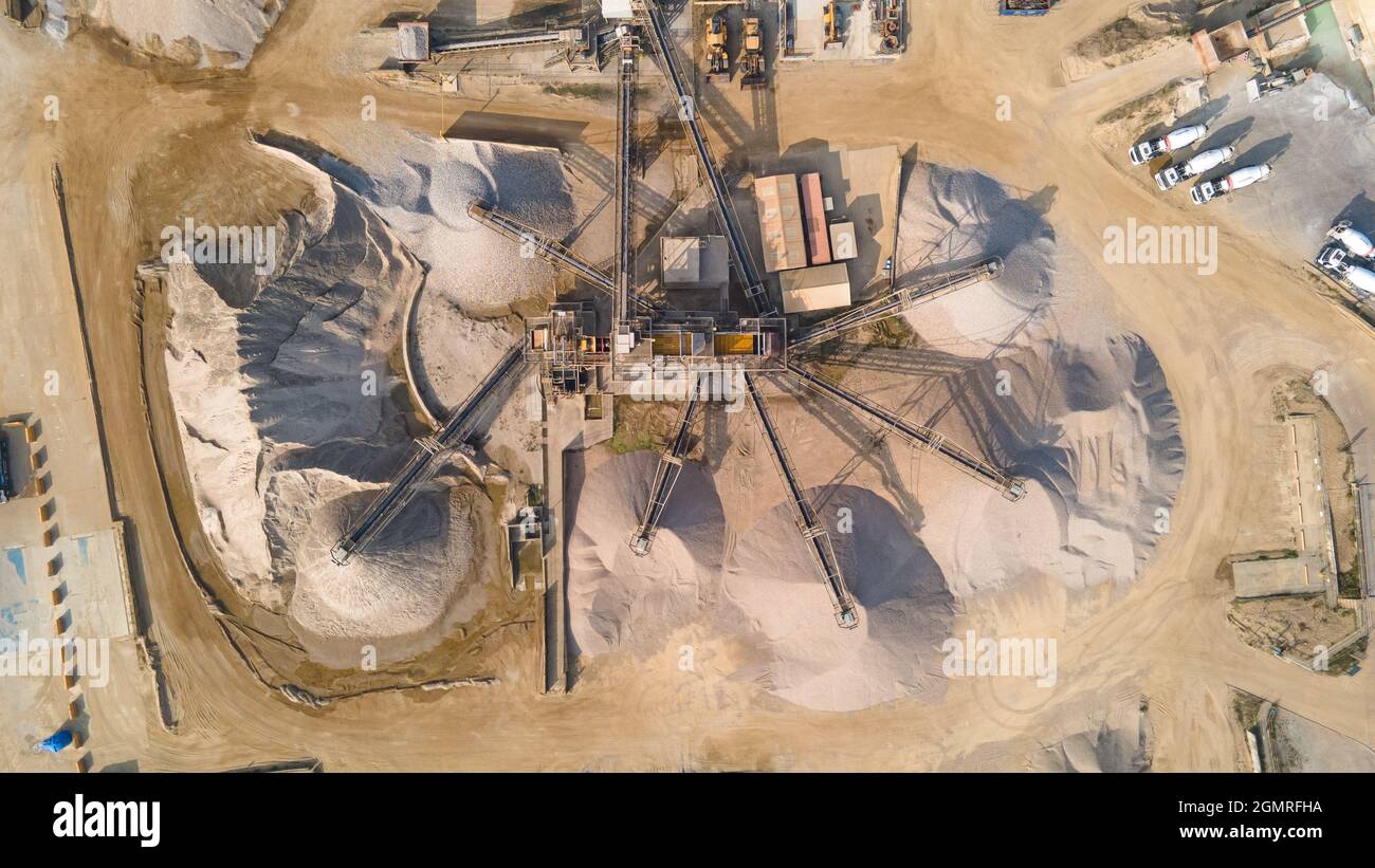 Aerial view of sand and grawel sorting pit by industrial estate, Hove, East Sussex, UK. Stock Photo