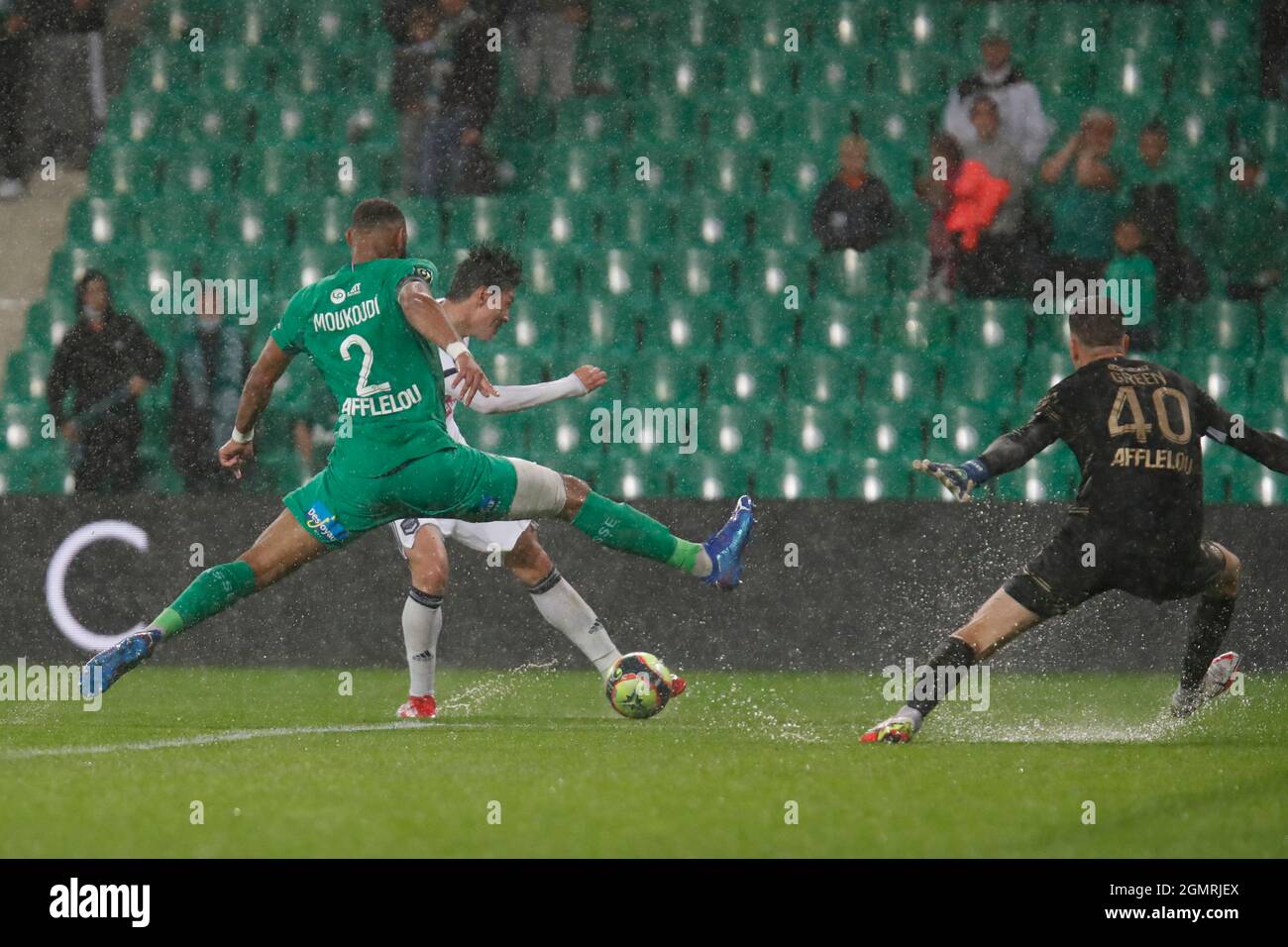 Ui Jo HWANG of Bordeaux score a goal and Harold MOUKOUDI of Saint Etienne  and Etienne GREEN of Saint Etienne during the French championship Ligue 1  football match between AS Saint-Etienne and