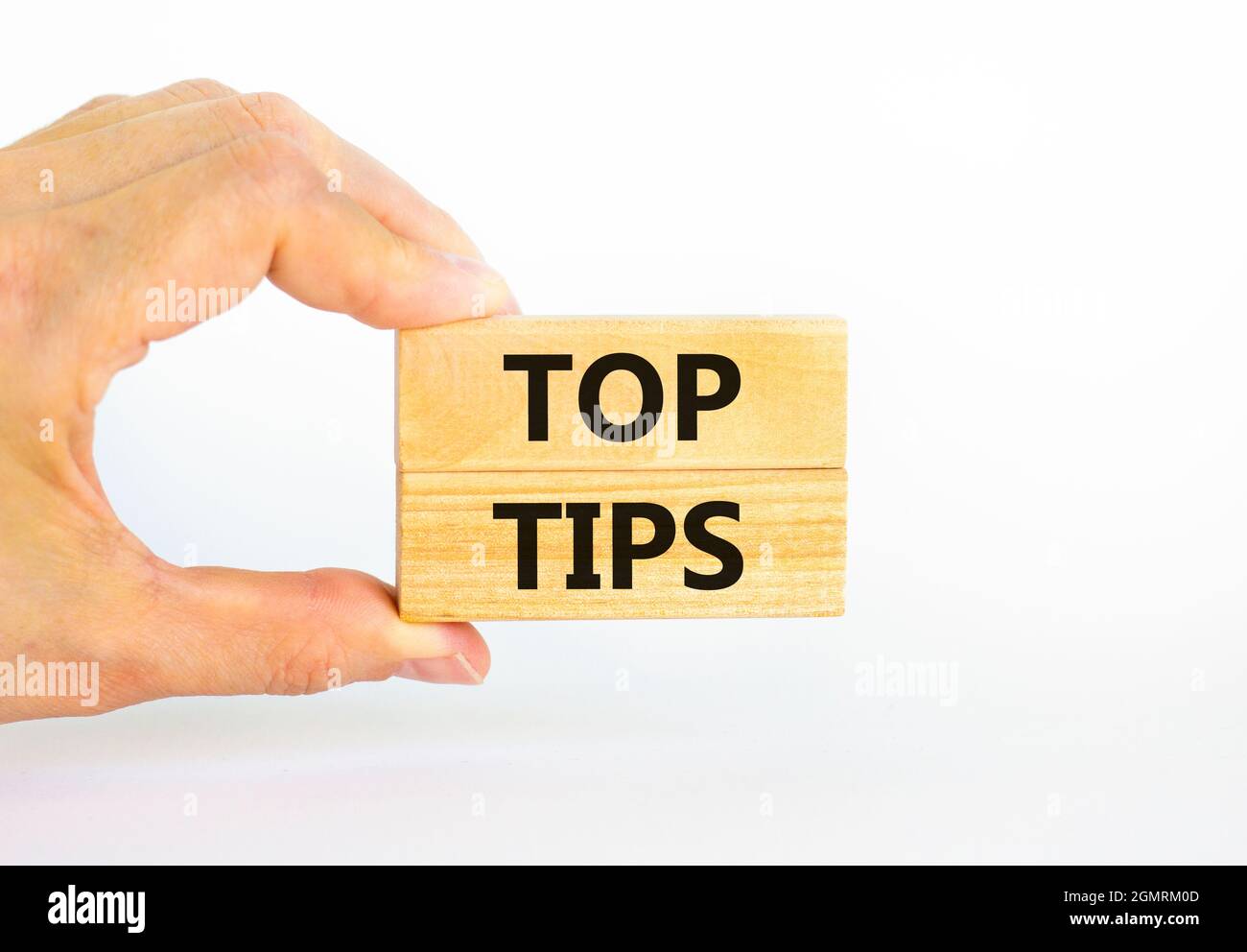 Toops Tips Top tips symbol. Concept words Top tips on wooden blocks on a beautiful ...