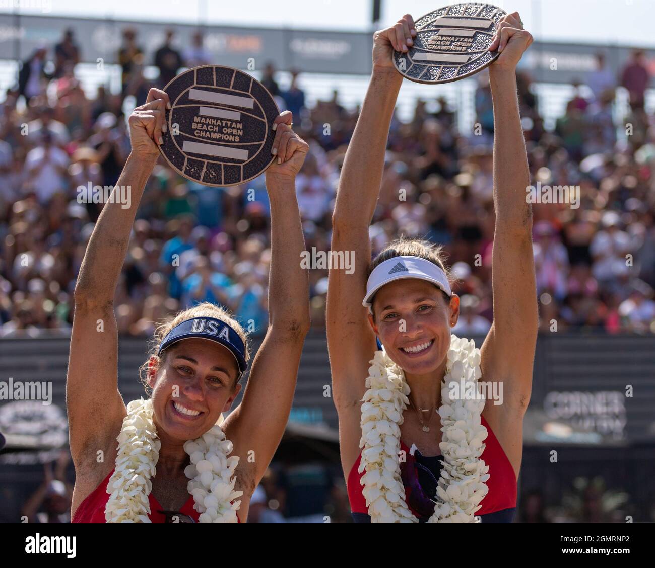 Olympic Gold Medalists April Ross and Alix Klineman pose with their