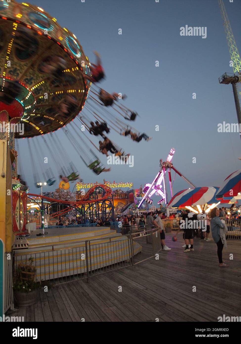 Seaside Heights, New Jersey during summer evening along the well known boardwalk. Rebuilt after Superstorm Sandy in 2012. Stock Photo