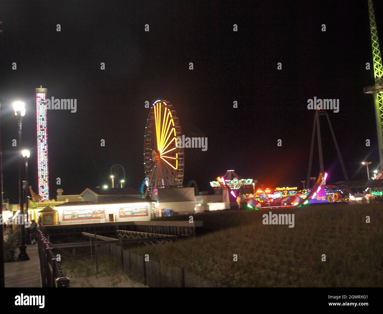 Seaside Heights, New Jersey during summer evening along the well known boardwalk. Rebuilt after Superstorm Sandy in 2012. Stock Photo