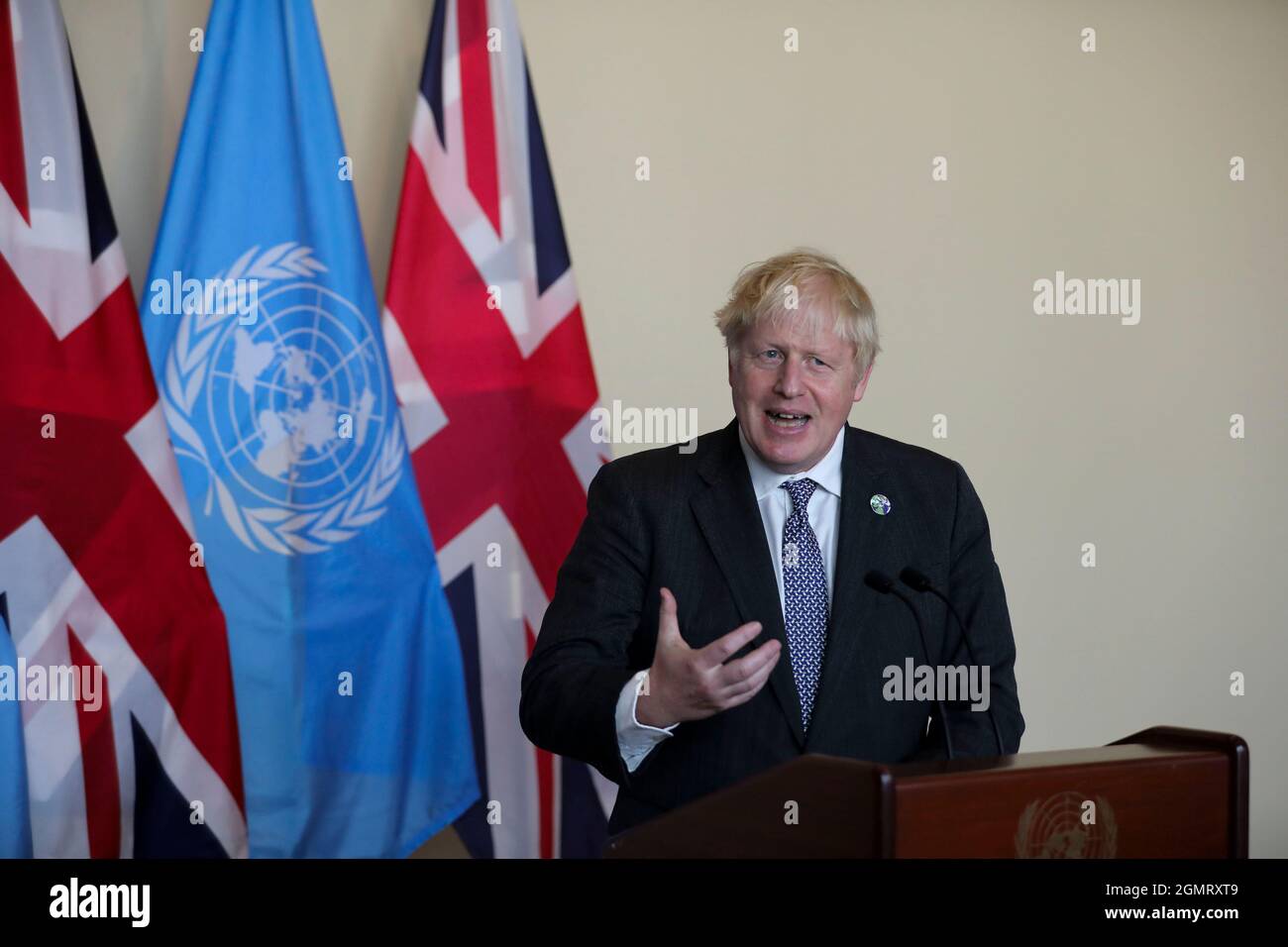 United Nations. 20th Sep, 2021. British Prime Minister Boris Johnson speaks to reporters after attending the Informal Leaders Roundtable on Climate Action at the UN headquarters in New York, on Sept. 20, 2021. Johnson said Monday that COP26 UN Climate Change Conference is 'a turning point' for the world. Credit: Wang Ying/Xinhua/Alamy Live News Stock Photo