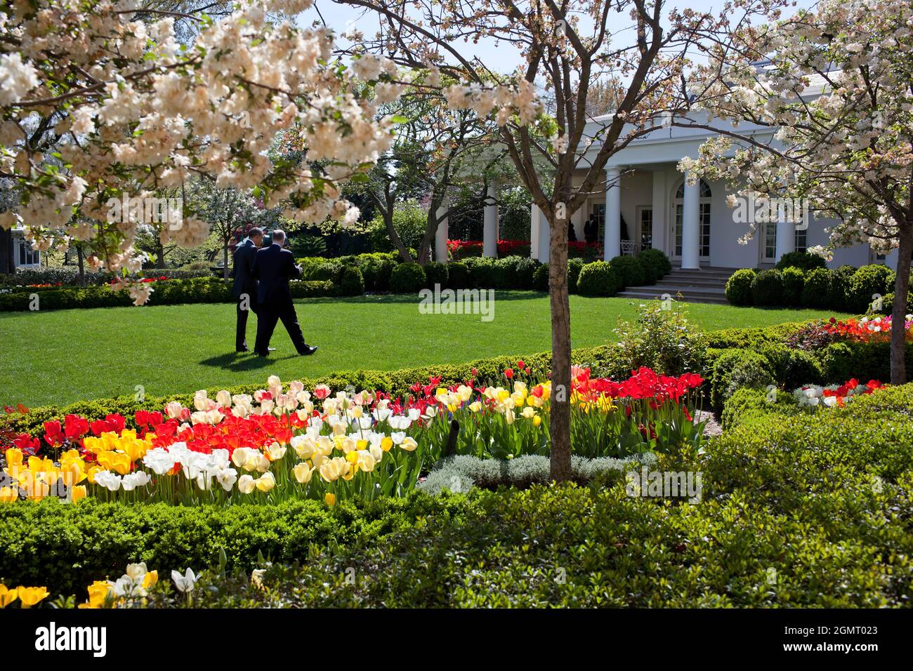 President Barack Obama walks  through the Rose Garden of the White House with National Security Advisor Tom Donilon, April 14, 2011. (Official White House Photo by Pete Souza)  This official White House photograph is being made available only for publication by news organizations and/or for personal use printing by the subject(s) of the photograph. The photograph may not be manipulated in any way and may not be used in commercial or political materials, advertisements, emails, products, promotions that in any way suggests approval or endorsement of the President, the First Family, or the White Stock Photo