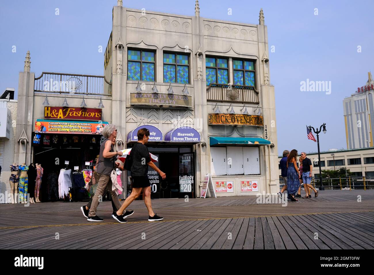 Pedestrians walking on Boardwalk in Atlantic City, NJ Stock Photo