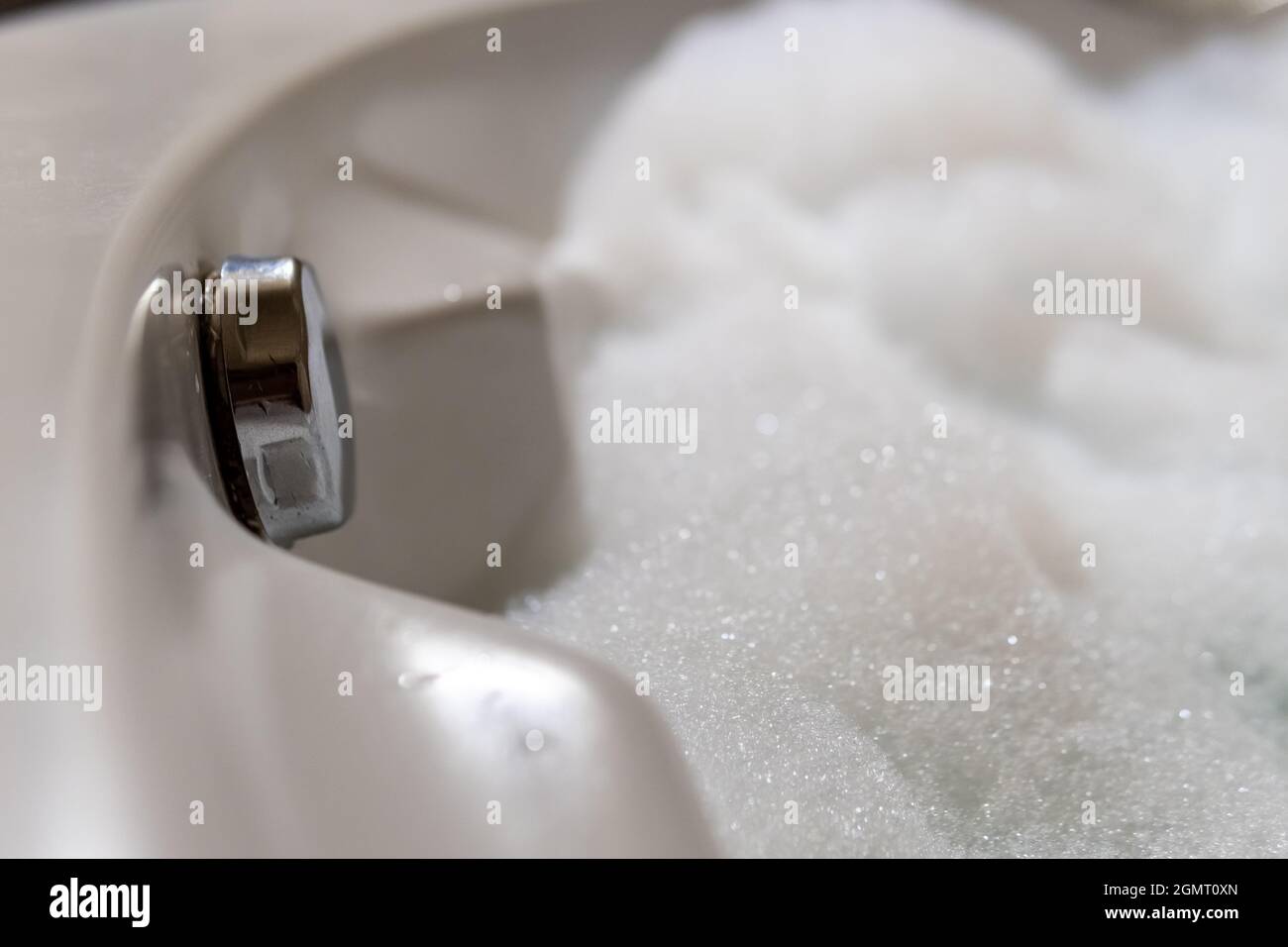 Jacuzzi, water drain valve, foamy water Stock Photo Alamy
