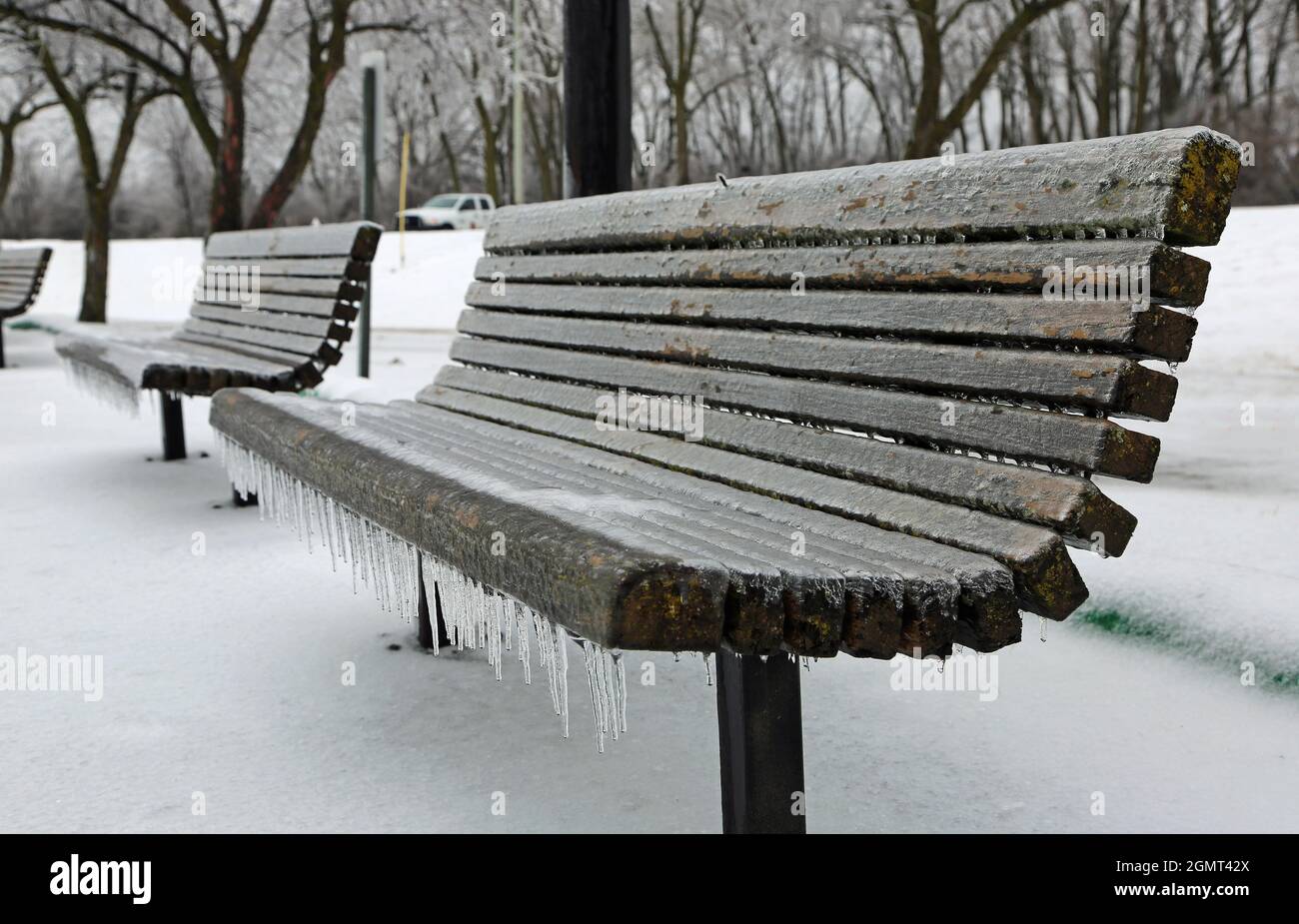 The bench in freezing rain Stock Photo