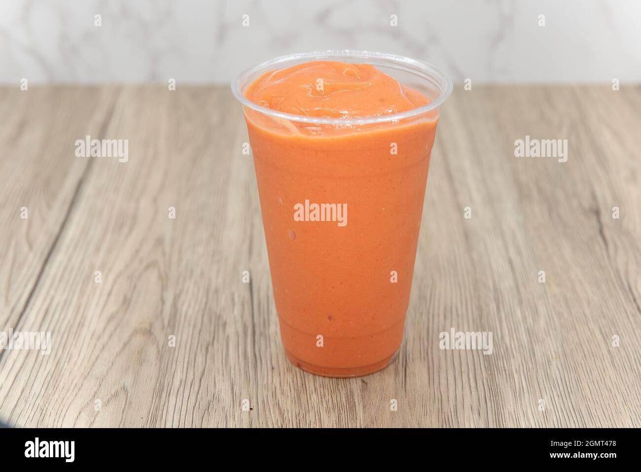 Tropical fruit smoothie cold drink beverage with blended flavors to