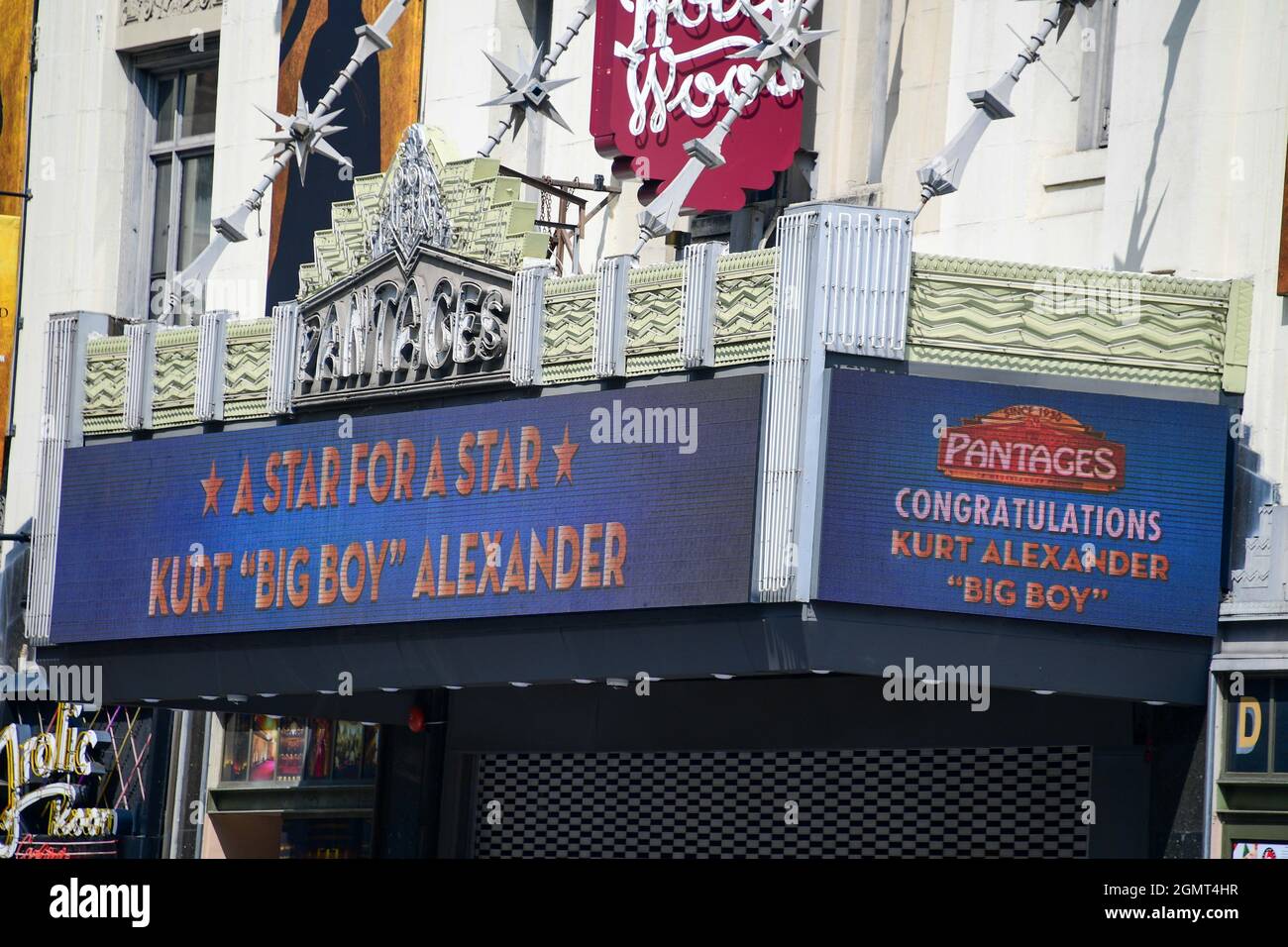 Signage illuminated on the Hollywood Pantages theater celebrates during a Hollywood Walk of Fame ceremony for Real 92.3 DJ Kurt “Big Boy” Alexander, W Stock Photo