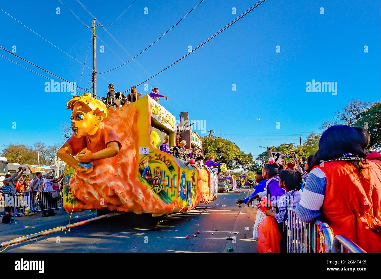 A Pac-Man Mardi Gras float makes its way down the street during the Joe Cain Day Mardi Gras parade, Feb. 7, 2016, in Mobile, Alabama. Stock Photo