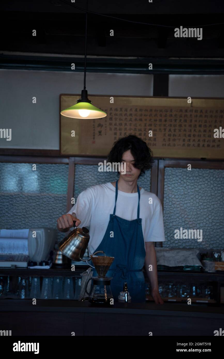 Man Has Put a Drip Coffee at Japanese style Cafe Stock Photo Alamy
