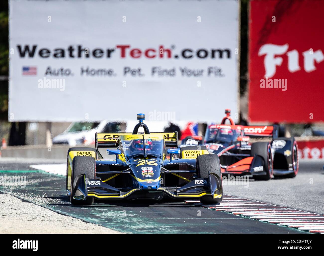 Monterey Race. 19th Sep, 2021. U.S.A. Andretti Autosport w/ Curb-Agajanian driver Colton Herta leads the pack out of turn 11 during the NTT Firestone Grand Prix of Monterey Race. Colton Hera won at Weathertech Raceway Laguna Seca Monterey, CA Thurman James/CSM/Alamy Live News Stock Photo