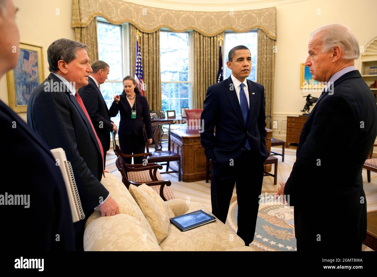 President Barack Obama, Vice President Joe Biden, right, and Special Envoy for Afghanistan and Pakistan Richard Holbrooke, left, in the Oval Office during a briefing prior to meeting with Afghan President Hamid Karzai May 6, 2009. Official White House Photo by Pete Souza. This official White House photograph is being made available for publication by news organizations and/or for personal use printing by the subject(s) of the photograph. The photograph may not be manipulated in any way or used in materials, advertisements, products, or promotions that in any way suggest approval or endorseme Stock Photo