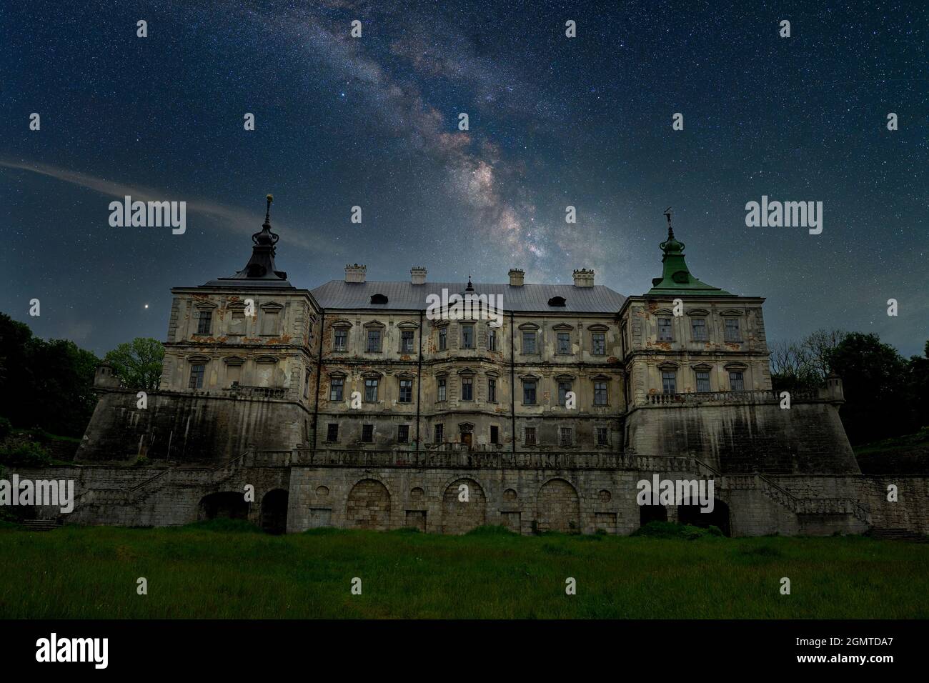 Stunning vibrant Milky Way composite image over landscape of Castle Stock Photo