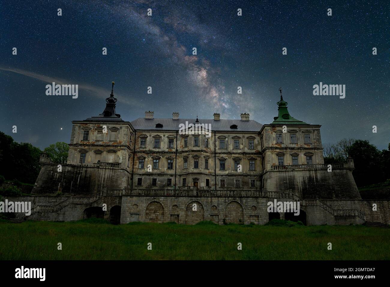 Stunning vibrant Milky Way composite image over landscape of Castle ...