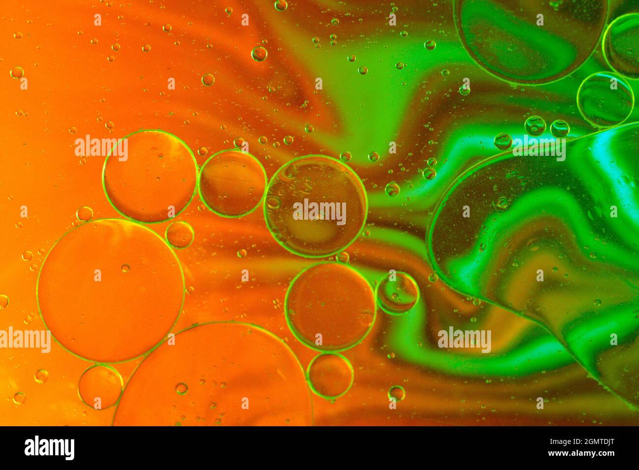 Green background whit red with blue abstract and dynamic bubble composition for web and posters Stock Photo