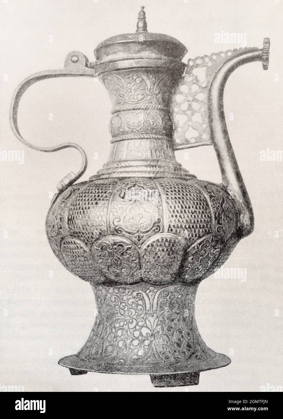 Hammered copper jug from 1671. Stock Photo