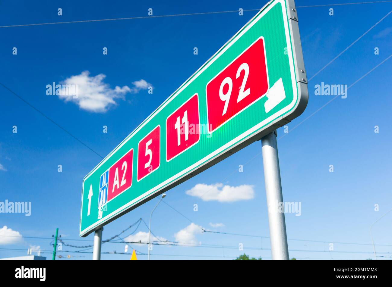 Road sign against the blue sky Stock Photo - Alamy