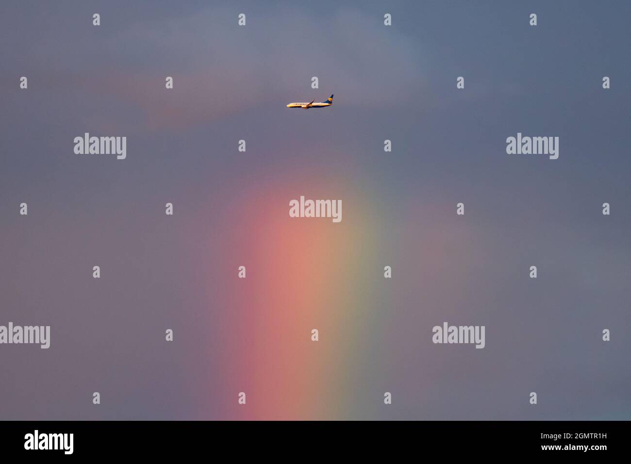Madrid, Spain. 20th Sep, 2021. A Ryanair airplane flying over a rainbow after some rain near the Adolfo Suarez Airport of Madrid. Credit: Marcos del Mazo/Alamy Live News Stock Photo