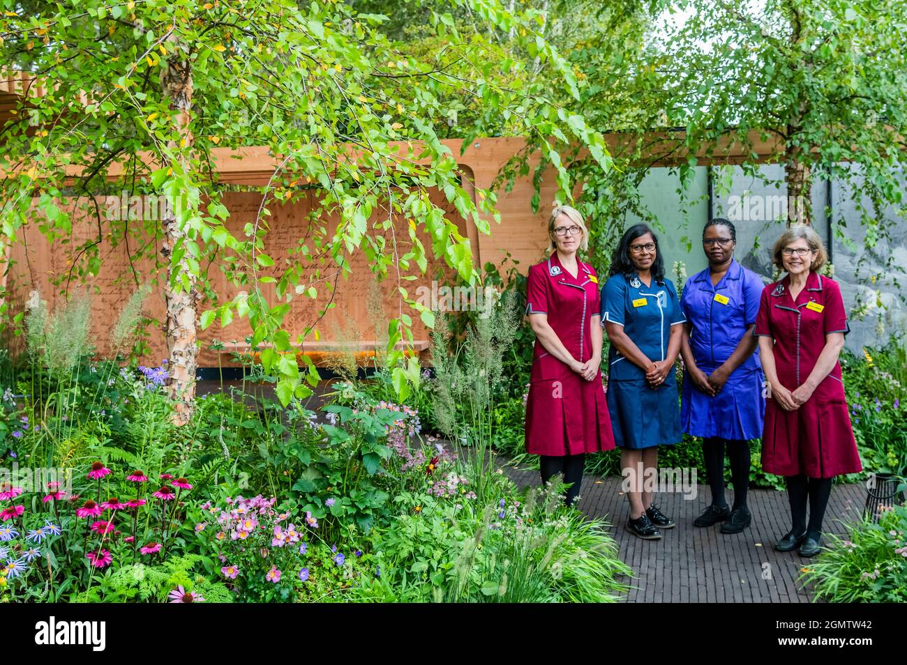 London, UK. 20th Sep, 2021. Four Nightingale nurses visit The Florence Nightingale Garden: A Celebration of Modern-Day Nursing Designed by Robert Myers - The 2021 Chelsea Flower Show. The show was cancelled last year due to the coronavirus lockdowns. Credit: Guy Bell/Alamy Live News Stock Photo