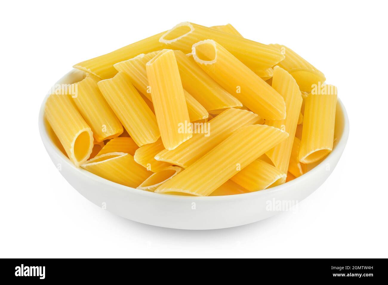 Raw italian penne rigate pasta in ceramic bowl isolated on white background with clipping path and full depth of field Stock Photo