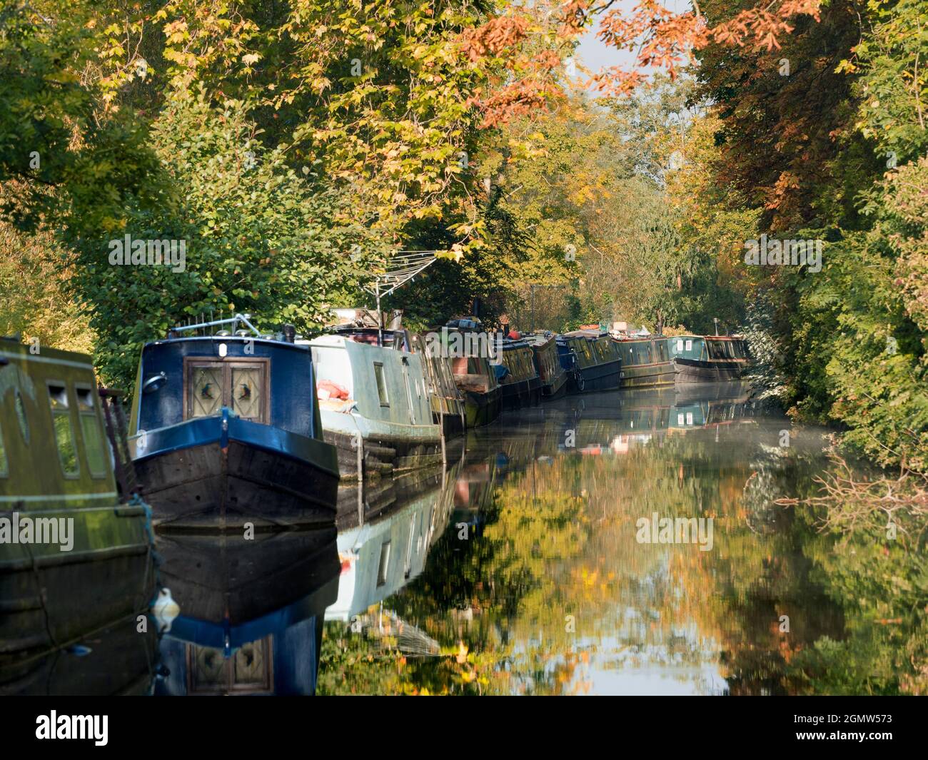 Oxford, England -  2011;  Oxford's waterways, canals, streams and rivers are a source of many tranquil, scenic delights. Here we see houseboats moored Stock Photo